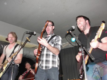 Dan Hay (far left), Mark Hyne (center) and James Nicol (right) of Amos the Transparent. (Photo: Calum Slingerhand/Aesthetic Magazine Toronto)