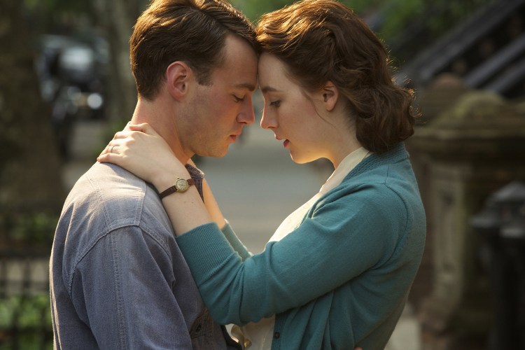 Mory Cohen as "Tony" and Saoirse Ronan as "Eilis Lacey" in BROOKLYN, which Michael Brook scored. (Photo: Kerry Brown)