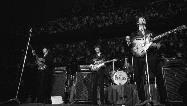 The Beatles perform a sold out show at Maple Leaf Gardens in Toronto on September 7, 1964. (Photo: Boris Spremo)