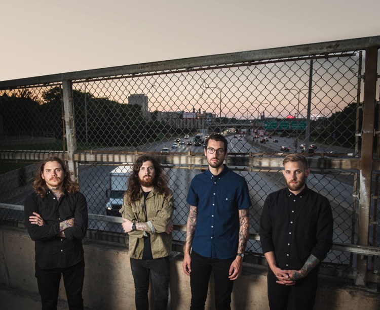 L-R: Mike Hranica, Jeremy Depoyster, Andy Trick, and Kyle Sipress of The Devil Wears Prada. (Photo: Anthony Barlich)