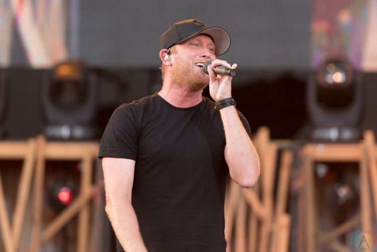 Cole Swindell performs at Faster Horses Music Festival in Michigan on July 21, 2017. (Photo: Jennifer Boris/Aesthetic Magazine)