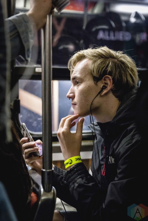 TORONTO, ON - NOVEMBER 2: Fans listen to the new Sam Smith album "The Thrill of it All" aboard a TTC streetcar in Toronto on November 2, 2017. (Photo: Anton Mak/Aesthetic Magazine)