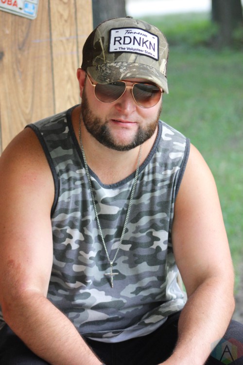 ORO-MEDONTE, ON - AUGUST 11: Chris Buck of Chris Buck Band poses for a portrait at Boots And Hearts Music Festival at Burl's Creek in Oro-Medonte, ON on August 11, 2018. (Photo: Curtis Sindrey/Aesthetic Magazine)