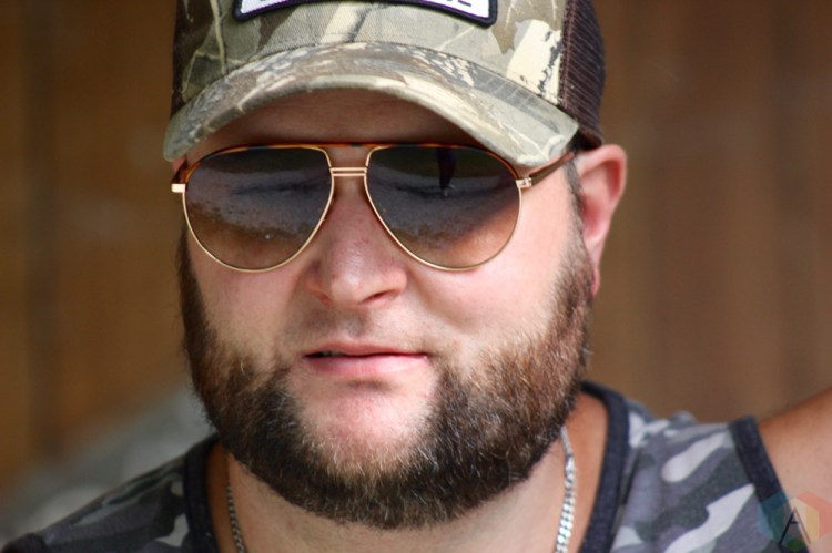 ORO-MEDONTE, ON - AUGUST 11: Chris Buck of Chris Buck Band poses for a portrait at Boots And Hearts Music Festival at Burl's Creek in Oro-Medonte, ON on August 11, 2018. (Photo: Curtis Sindrey/Aesthetic Magazine)