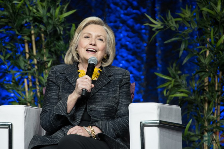 TORONTO, ON - NOVEMBER 27: Bill Clinton and Hillary Clinton appear at Scotiabank Arena in Toronto on November 27, 2018. (Photo: Jaime Espinoza/Aesthetic Magazine)