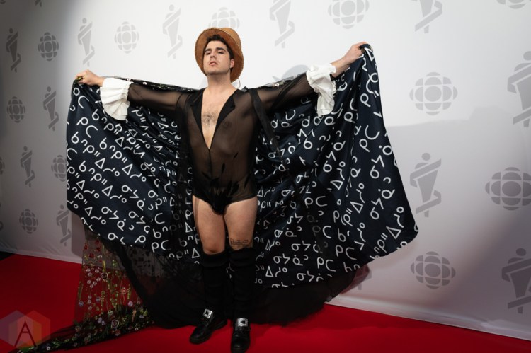 LONDON, ON - MARCH 17: Jeremy Dutcher attends the 2019 Juno Awards red carpet at Budweiser Gardens in London, Ontario on March 17, 2019. (Photo: Brendan Albert/Aesthetic Magazine)